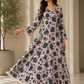 Printed long dress in cream and bottle green EL0LD1