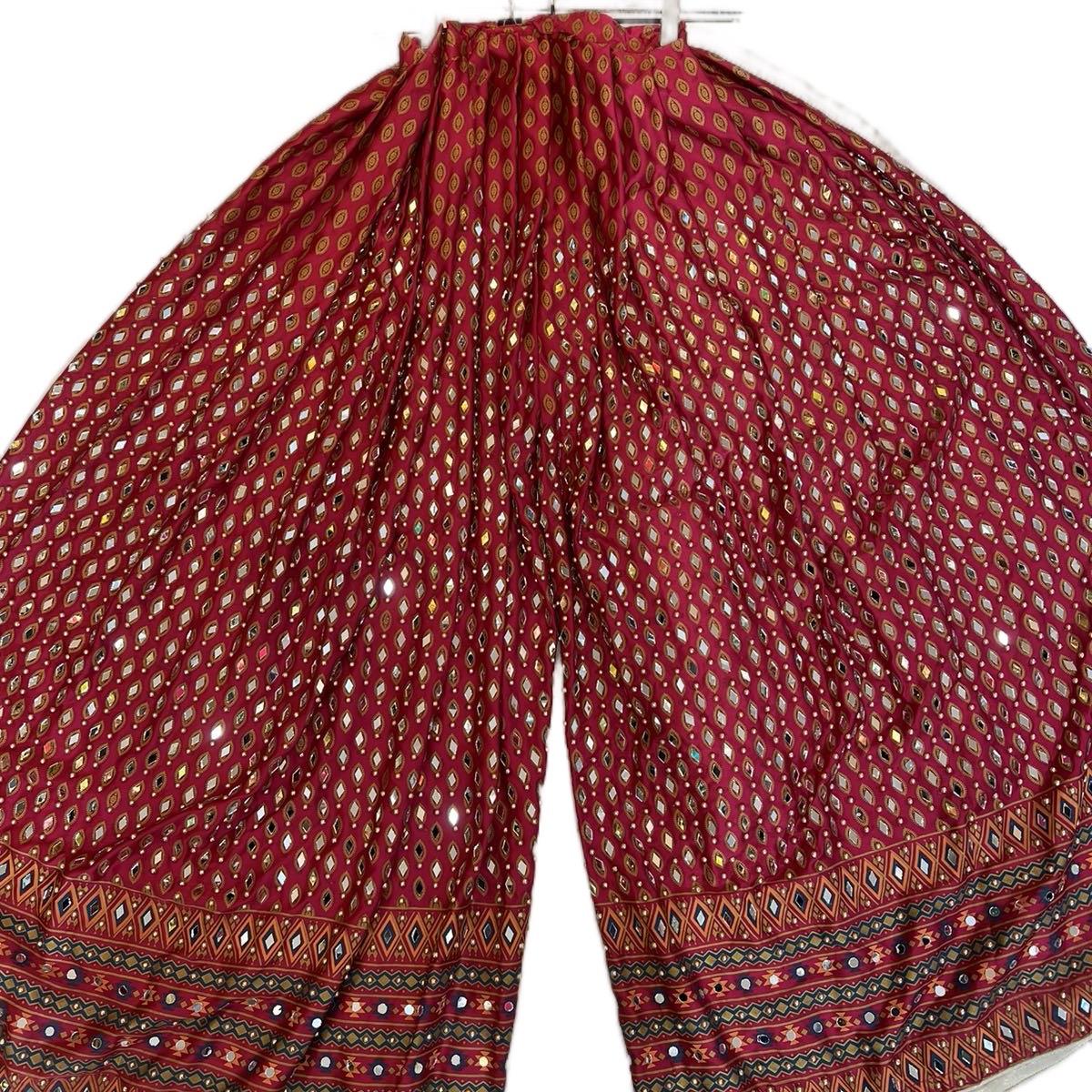 Mehndi Plazo trousers with heavy mirror work and bead.